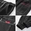 Pantaloni cargo hip-hop streetwear Jeans da uomo Pantaloni elasticizzati Harun Joggers in autunno e inverno 240313