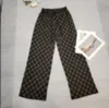 Pantalones para mujer Capris Diseñador Diseñador 2023 Primavera y otoño Nuevo producto Carta Impresión completa Jacquard Casual Elástico Alto Cintura Media Pierna ancha Pantalón XMYI 9JEZ