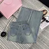 Projektant dżinsów dżinsowych 2024 Nowy wiosna Nowy Nanyou Miu Modne i wszechstronne, Love Cain Chain Pocket Denim Straight Leg Pants for Women M2QJ