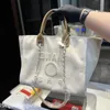 디자이너 가방 핸드백 여름 해변 토트 C 편지 어깨 반짝이는 사무실 가방 고품질 클래식 여성 캔버스 가방 버튼 레트로 LA GVFX