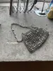 Borse a tracolla alla moda Borse di design con perline in metallo Borsa a tracolla da donna Singolo gnocco tessuto Perla argento 240311