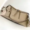 Sac à bandoulière crossbody de qualité supérieure Véritine en cuir creux de la lettre détachable de la chaîne détachable à grande vitesse Metal Nail inner Patch Pocket Designer Sac à main