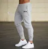 Calças casuais dos homens das mulheres jogging sweatpants homem clássico joggers calça outono inverno mulher ao ar livre ginásio moletom elegante lado bos calças