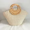 2023 New Handheld Grass Woven Bag Simplified Forest Series Woven Women's Bag Vacation Bag Versatile Fashion Trendy Bag 240315