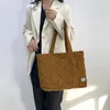 Kvällspåsar Kvinnor Padding Top Handle Bag Corduroy quiltad avslappnad stor kapacitet Ren färg Lätt kvinnlig utomhus shopping