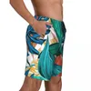 Pantaloncini da uomo Tavola estiva Foglie tropicali che corrono Pantaloni corti da spiaggia verdi e blu Y2K Divertenti costumi da bagno ad asciugatura rapida di grandi dimensioni