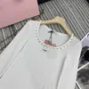 Dames T-shirt ontwerper Vroege lente Nieuw Nanyou Miu-stijl Veelzijdig Letterborduurwerk Zware industrie Nail Diamond Nekband Ondershirt met lange mouwen voor dames ZV0Z