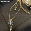 Accessori di gioielli Collana a doppia catena con stella in pietra smaltata blu, scarabeo dorato, perla, regali per feste da donna 240311