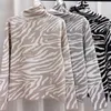 Camisetas para mujer 2024 Ropa de invierno delgada cálida delgada casual interior lapeado interior impresión geométrica cuello alto jerseys camisetas
