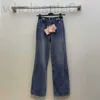 Designer dżinsowy 24 wczesna wiosna Nowa nanyou miu lenina i szczupła, kontrastowy metalowy klamra gradient prania dżinsowe spodnie nogi foy5
