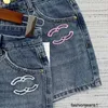 Damenjeans Hohe Version Xiaoxiang 24 High-End-Modische High-End-Jeans und Shorts mit rosa Flockmuster und hoher Taille in zwei Farben KJOQ