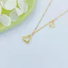 Chaînes Véritable Pure Pure 18K Chaîne en or jaune Femmes Lucky Double Coeur Pendentif O Link Collier 1.98-2g