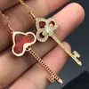 Designer Tiffay och Co Key Necklace 18K Rose Gold Iris med diamanter Lätt lyxig enkel högkvalitativ tröja hänge