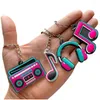 Party Decoration 12 Pieces Music Favors 80S Decorations Sile Keychain Musical Note Roll Themed Supplies Radio Earphone Shaped Drop D Dh2Gq
