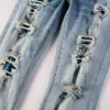 Designer Mens Jeans High Street Blue Diamond Washed Denim avec patch tendance en détresse Jeans élastiques Rock Revival Jeans Hole Blue Pants