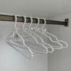 Hängare 2st Rymdbesparande miljövänliga ingen luktbutik Display Faux Pearl Rack Kläderhängare Hemtillbehör