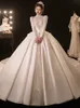 Luxurious Arabic Crystals Sequins Wedding Dresses Ball Gown Long sleeved Bling Sparkly Retro Palace Style Satin Bridal Gowns Court Train