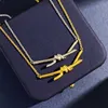 Designer TS Knot Necklace Womens Ins Wind Plated 18k Gold Cross Slooth Samma krage kedja 271h