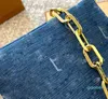 Modedesigner-Taschen aus Denim-Canvas bringen lässige Kettentaschen