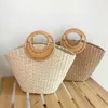 2023 New Handheld Grass Woven Bag Simplified Forest Series Woven Women's Bag Vacation Bag Versatile Fashion Trendy Bag 240315