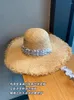 Chapéus de borda larga Chapéu de protetor solar tecido com grande palha lafite para um rosto pequeno verão versão coreana praia sol