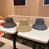 märke hink hatt designer hink hatt lyxig hatt xletter fast färg material plysch design hatt temperament mångsidig avslappnad stil strand strand designer hatt trevlig