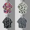 Short sleeved shirt mens summer Korean version trend loose Hawaiian ruffian handsome seaside flower shirt trend