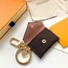 Designer Letter Wallet Keychain Keyring Fashion Purse Pendant Car Chain Charm Brown Flower Mini Bag Trinket Gifts Tillbehör ingen låda