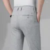 Pantaloni da uomo 2024 tessuto di cotone traspirante estivo pantaloni casual da uomo sottili elasticizzati diritti grigio blu pantaloni da lavoro formali da uomo