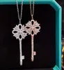 Designer Tiffany and Co Collier clé en argent sterling 925 plaqué 18 carats Goldie Family Flocon de neige Oeil de cheval Pendentif Chaîne de pull