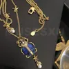 Accessori di gioielli Collana a doppia catena con stella in pietra smaltata blu, scarabeo dorato, perla, regali per feste da donna 240311