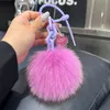 10cm/4 "Yumuşak gerçek tilki kürk topu pompom cazibesi anahtarlık anahtarlık telefon kolye anahtarlık hediye püskülleri