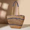 Ny Hollow Woven Fashionable Women's Bag Contrast Color Paper Rep Straw Woven Bag Travel Holiday Photo Bag 240315