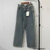Jeans femininos versão correta das calças de corrente tecidas de metal 23 outono-inverno de Xiaoxiangjia com bolso traseiro duplo C jeans bordados FXQ4