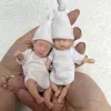 Poppen 10 cm minipalm zacht volledig massief siliconen Bebe herboren meisje met twee sets outfits handgemaakte knuffelige levensechte herboren poppen