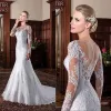 Abito da sposa a sirena Collo trasparente Applicazioni in pizzo Maniche lunghe Abito da sposa Corte dei treni Illusion Abiti da sposa Abiti da Noiva