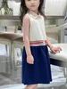 人気の女の子のドレスアップダウンスプライシングデザインキッズスカートプリンセスドレスサイズ100-160 cmキッズデザイナー服ベビーラペルフロック24マー