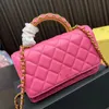 حقيبة Crossbody الكلاسيكية العالية WOC WOM Women Mini Handbags المصممين جودة Matelasse Hollow Pres