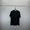 Summer Mens Designer T Shirt Casual Man Womens Loose Tees med bokstäver Tryck Kort ärmar Top Sell Luxury Men Loose Edition T Shirt Size M-XXXL W48