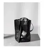 Bolsas de noche 2024 Diseñador Moda Lady Luxury Black Hombro Bolso Vender Vintage Simple Cowhide Bucket Crossbody Wandering Bolso de mujer