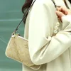 La liquidation d'usine limitée est un vendeur chaud de nouveaux sacs à main de créateurs Olay Counter Modèle de texture haut de gamme Kouqiu Winter Womens Bag Small Mobile