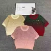 Maglia da donna T-shirt Designer 2024 Primavera/Estate Nuova industria pesante Lettera intarsiata con diamanti Girocollo Pullover Manica corta Camicia lavorata a maglia Top con diamanti colorati sfumati