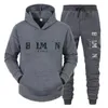 Nowy Hot Designer Mens Tracksuit dostosowuje luksusowe logo drukowane bluzie swobodne spodnie dwuczęściowe Zestaw mężczyzn mężczyzn dla kobiet polarowych.