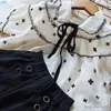 Комплекты одежды Летние комплекты одежды для девочек Корейская версия Милый галстук-бабочка с отворотом Кружева с короткими рукавами + шорты Костюм из двух предметов Новая детская одежда
