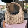 Design handbag clearance sale 2024 New Handheld Underarm Bag Folded Cloud Fashion Trend Womens Crcent