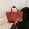 Sacs à main élégants des meilleurs designers Sac fourre-tout haut pour les déplacements quotidiens du printemps, de l'automne et de l'hiver pour femmes dans des sacs à bandoulière à main avec chaîne en diamant de grande capacité