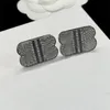 Klasyczne projektantki kolczyki stadninowe BB pełna diamentowa biżuteria Komektowe Kolczyki uczucie pełnego diamentu podwójne B Earme