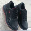 Zapatos de hombre nuevos de cuero de otoño e invierno zapatos deportivos impermeables de ocio antideslizantes olor negro trabajo suela blanda correr