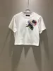 2024 Tweedelige jurk Fashion Runway dames tweedelige bloemenprint rokpak O-hals T-shirt met korte mouwen Top met hoge taille rokset Outfit