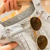 衣類セット夏の新しいスタイルの女の子ベスト衣類セット小児レンズ刺繍花サスペンダージーンズパンツツーピーススーツ